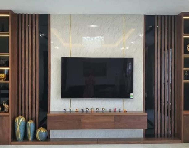 Bí quyết kết hợp tấm PVC vân đá và lam sóng cho phòng khách hiện đại